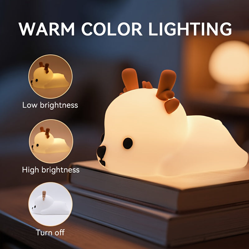 Animal-shaped night light with brightness control options on a dark background