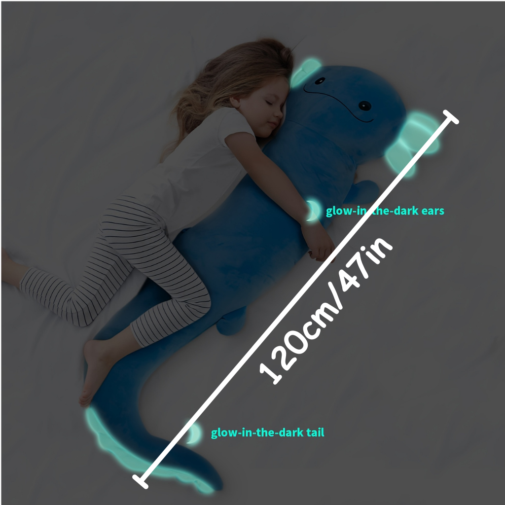 Child lying on a large blue axolotl plush toy with glowing features, measurement stating 120cm/46in